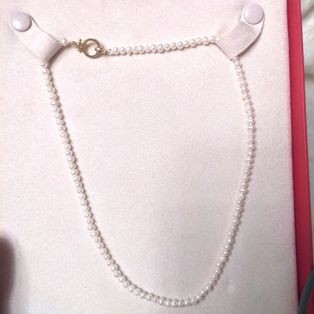 Fresh water pearls. 14in